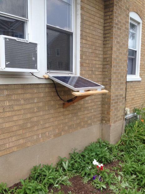 Panneau solaire derriere fenetre